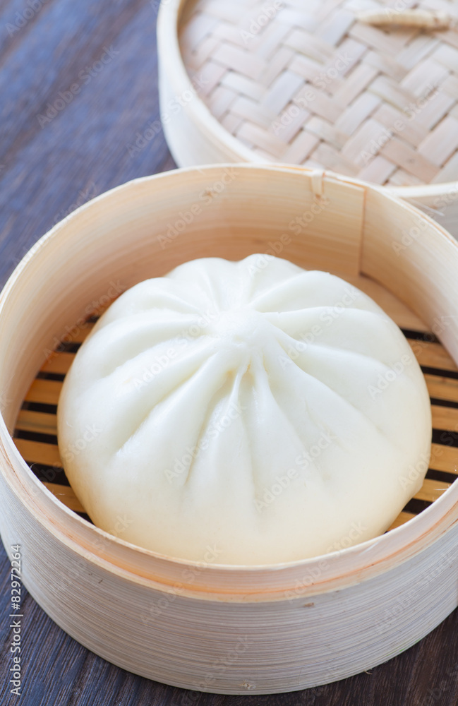 chinese cuisines steamed bun in asian style bamboo basket chinese cuisines steamed bun in asian style bamboo basket