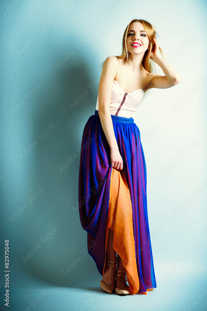 Expressive young model on blue background