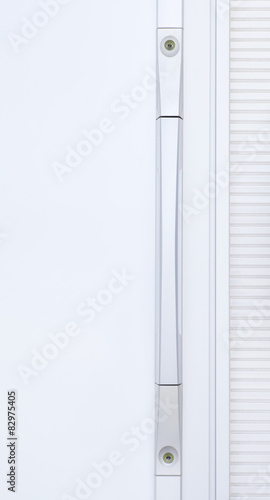 Close - up The modern silver metal door handle