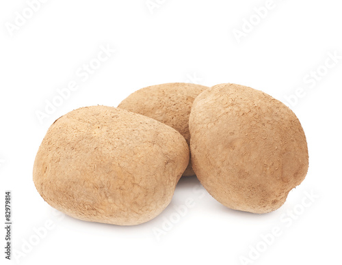 Pile of dirty earth potatoes isolated