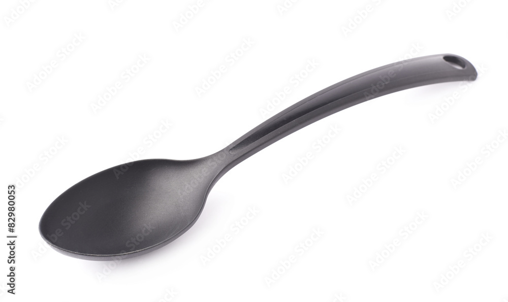 Black plastic kitchen ladle spoon isolated Black plastic kitchen ladle spoon isolated