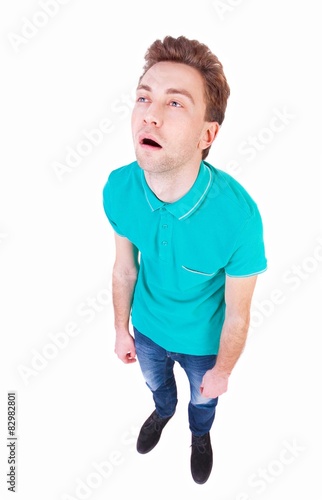 Fotografie Top view of a bored man. tired man looking up