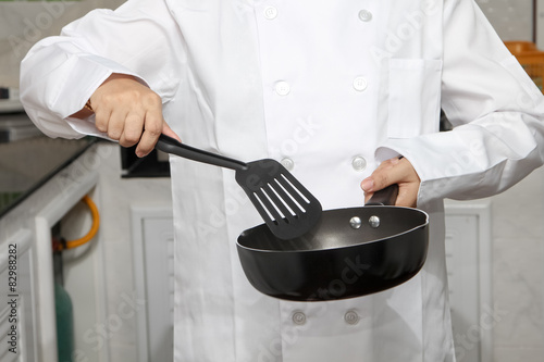 chef holding pan
