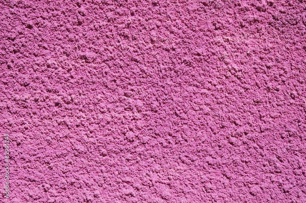 Pink decorative relief plaster on wall Pink decorative relief plaster on wall