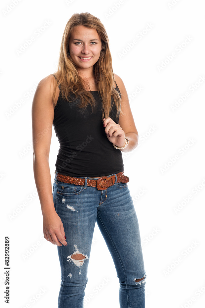 Selbstbewusste junge Frau in Jeans Selbstbewusste junge Frau in Jeans