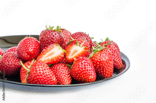 Strawberry in disk on white background