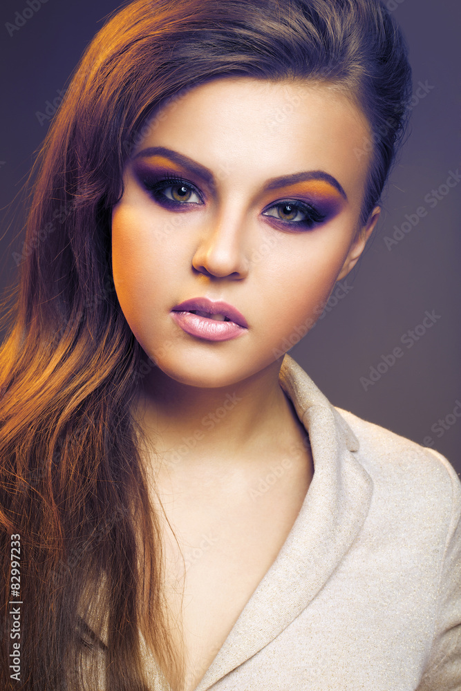 Naklejka premium portrait of a beautiful girl with red hair