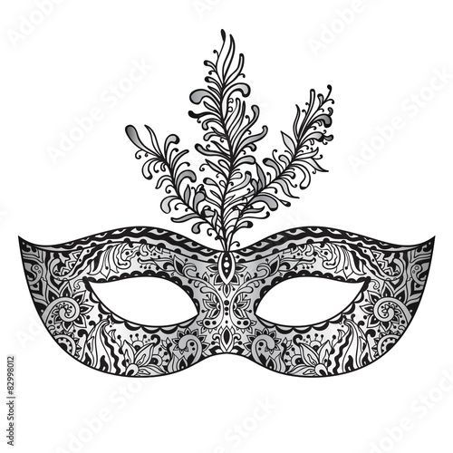 Vector ornate floral Venetian carnival mask with feathers.