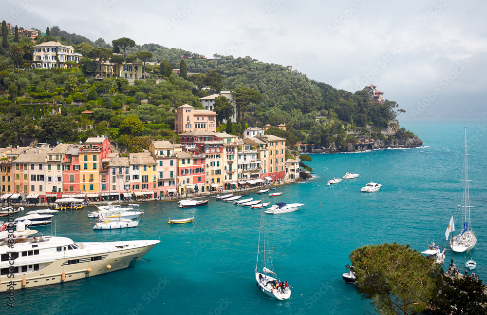 Idyllic Portofino Harbor: Vibrant Seaside Town with Luxury Yachts, Italy