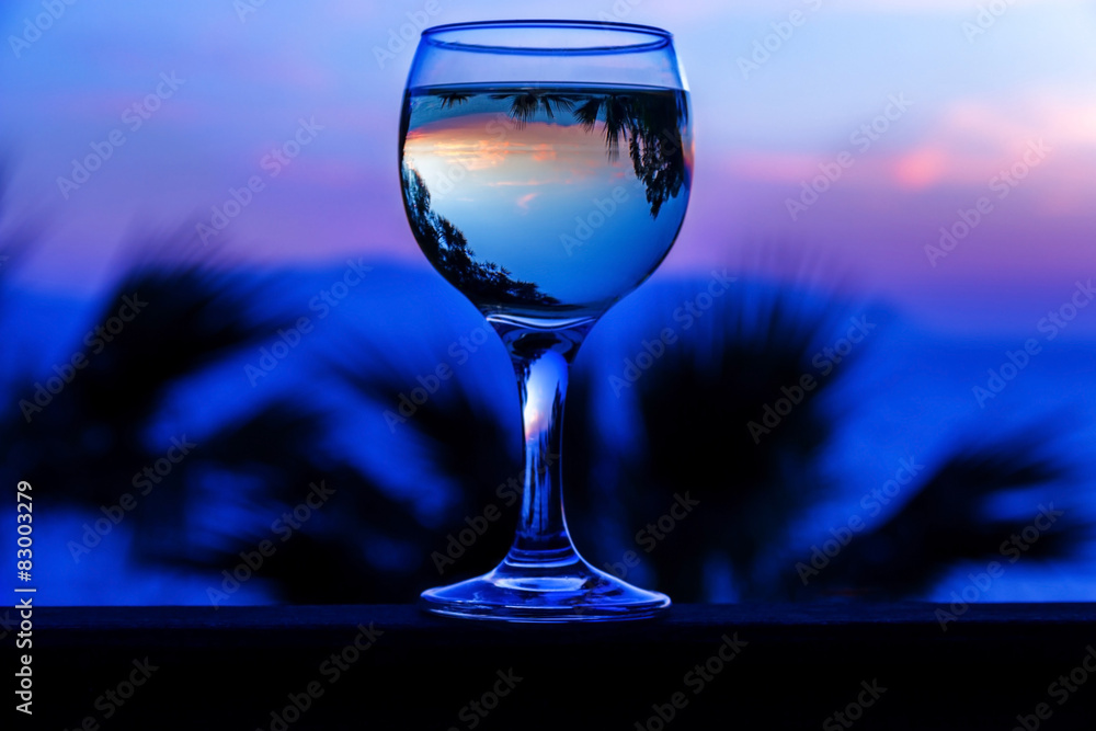 Obraz premium white wine on the sunset