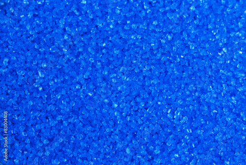 Full frame bright royal blue candy sprinkles food background