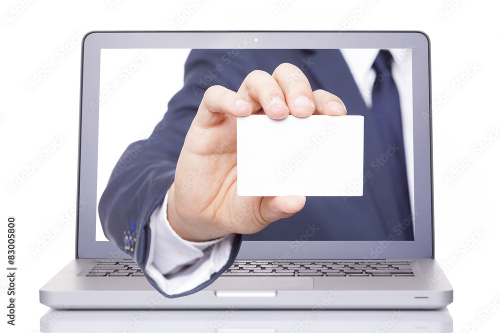 Business man hand giving a business card through a laptop, isola Business man hand giving a business card through a laptop, isola