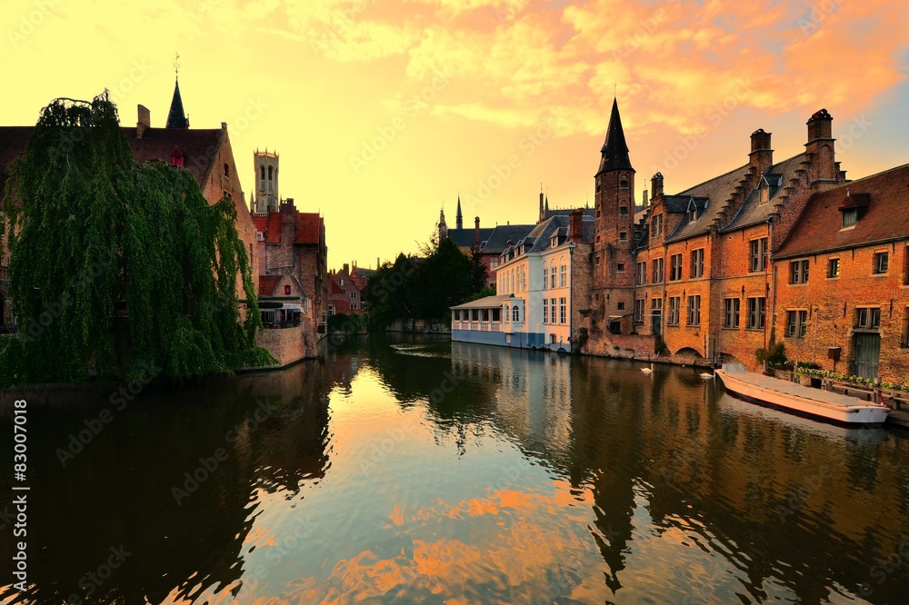 Sunset over the beautiful medieval canals of Bruges, Belgium
