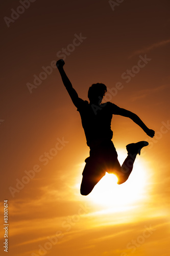 Silhouettes of jumping man © ellisia