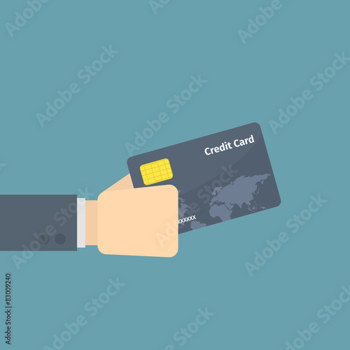 businessman holding credit card