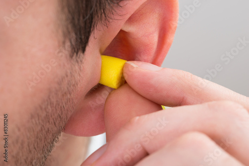 Person Ear With Earplug