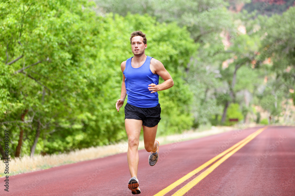 Sport and fitness runner man running on road Sport and fitness runner man running on road