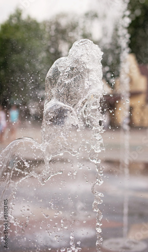 Water drops fly at city backgrond