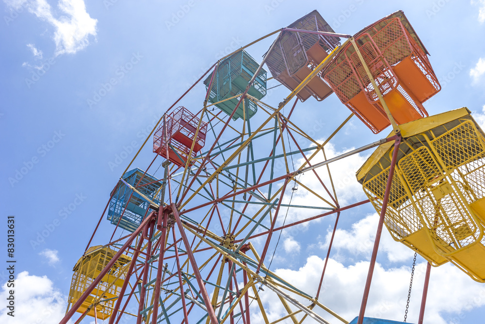 Ferris wheel and natural sunlight with blue skies. Ferris wheel and natural sunlight with blue skies.