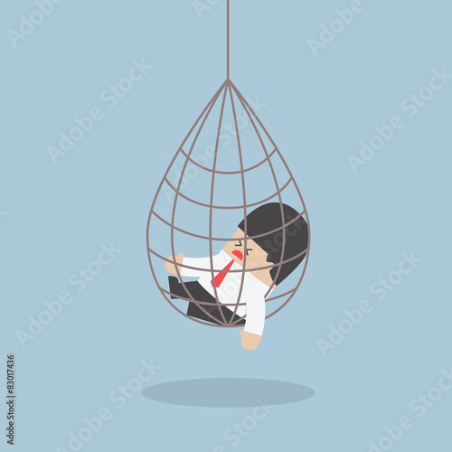 Businessman caught in a net trap