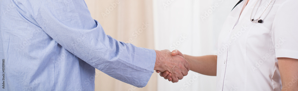 Nurse and man handshake Nurse and man handshake