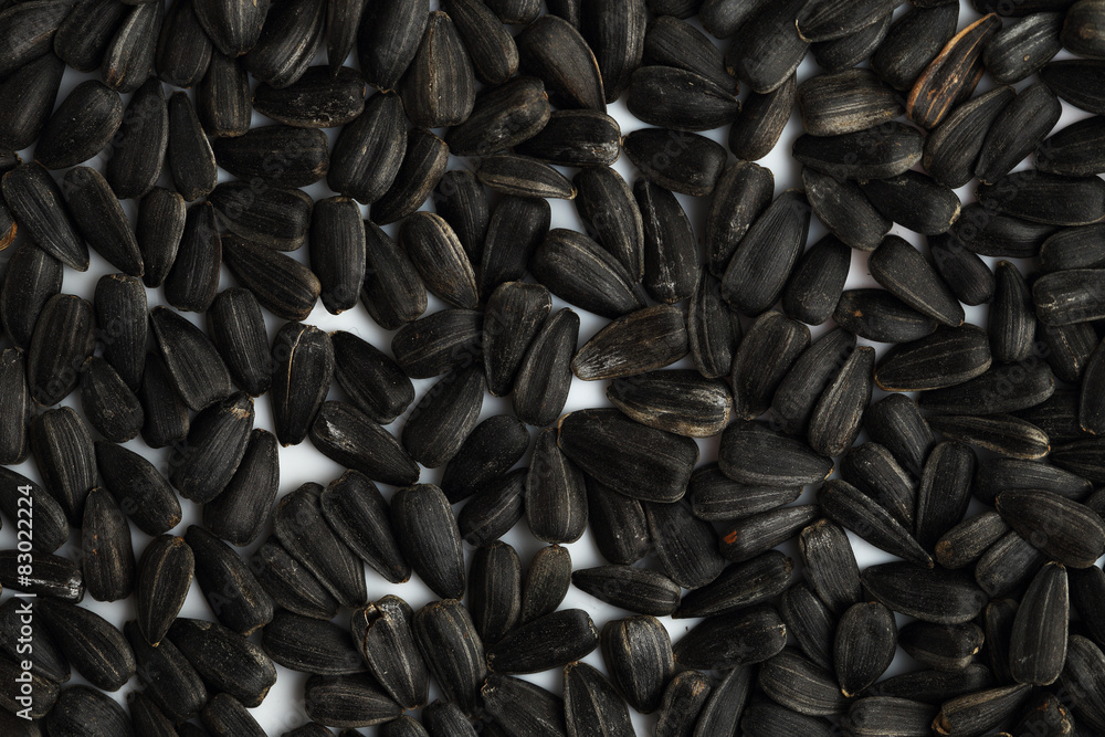 Black sunflower seeds close-up. Background Black sunflower seeds close-up. Background