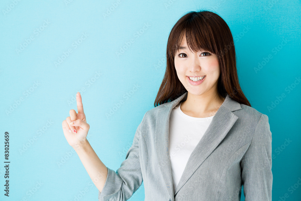 asian businesswoman on blue background asian businesswoman on blue background