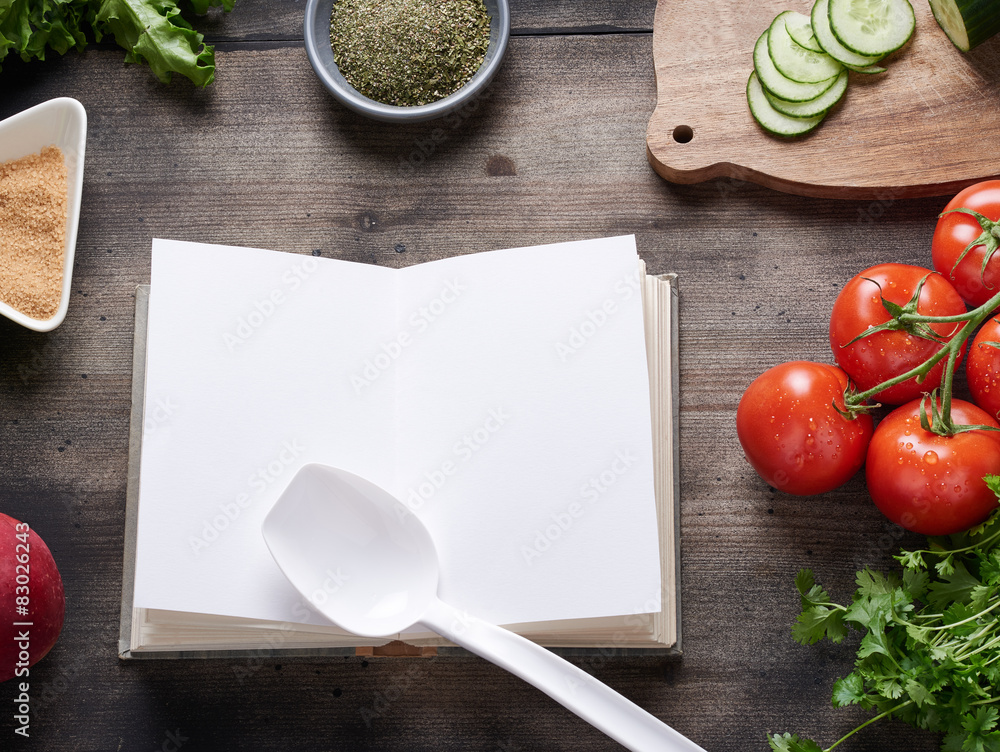 Cooking book on wooden table