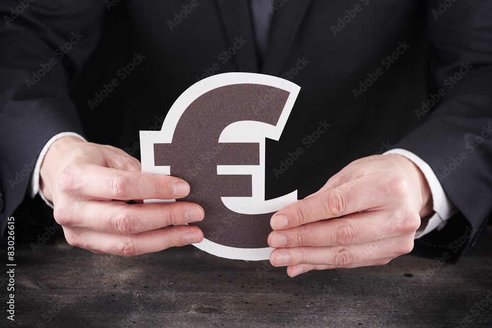 Man holding euro icon in hands