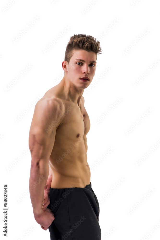 Handsome bodybuilder doing tricep pose, isolated Handsome bodybuilder doing tricep pose, isolated