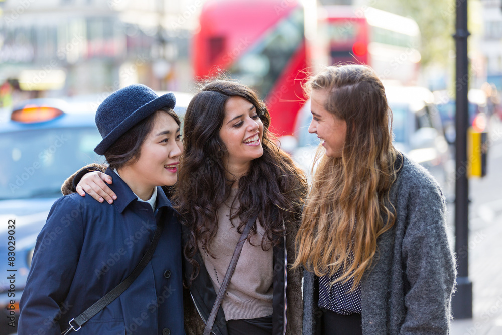 Multiracial group of girls walking in London