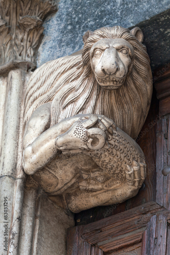 Statue of a Lion holding a Lamb at Monza Cathedral Statue of a Lion holding a Lamb at Monza Cathedral