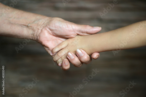 Hand of old people and a baby hand  © aletia2011