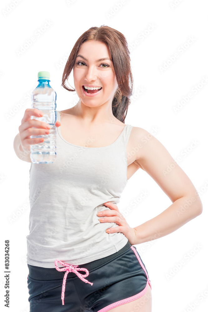 happy girl holds a bottle of drinking water happy girl holds a bottle of drinking water