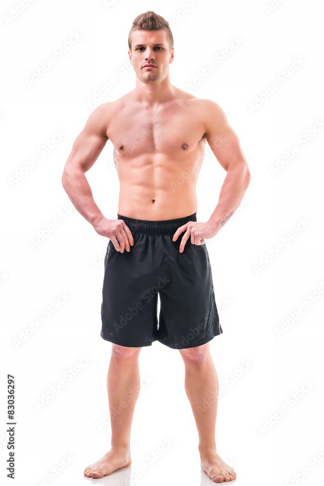 Full body shot of shirtless muscular young man Stock Photo