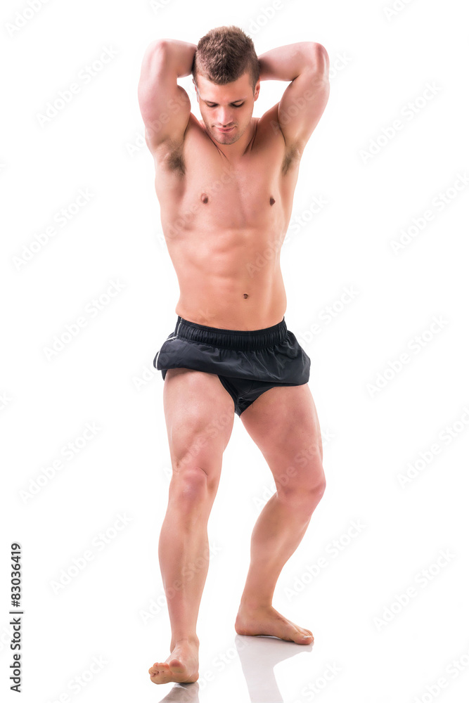 Full body shot of shirtless muscular young man Full body shot of shirtless muscular young man
