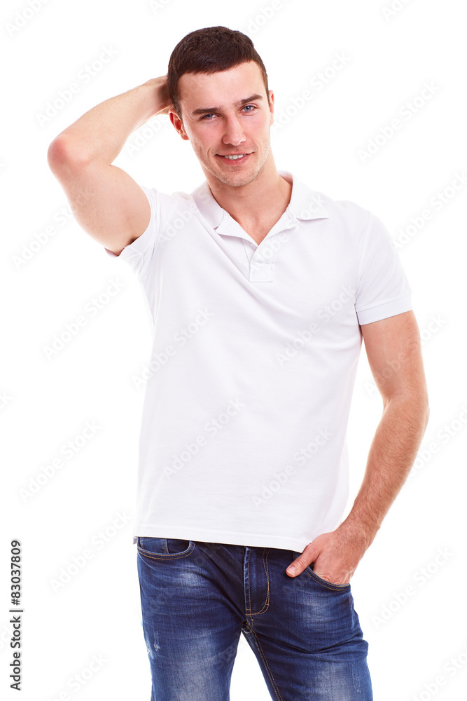 Fototapeta premium Young happy man in a white polo shirt