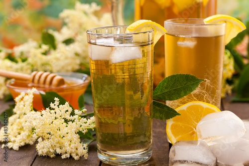 Homemade summer drink of elderflower with lemon and ice