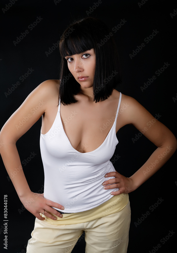 The full girl with the big breast on a black background The full girl with the big breast on a black background