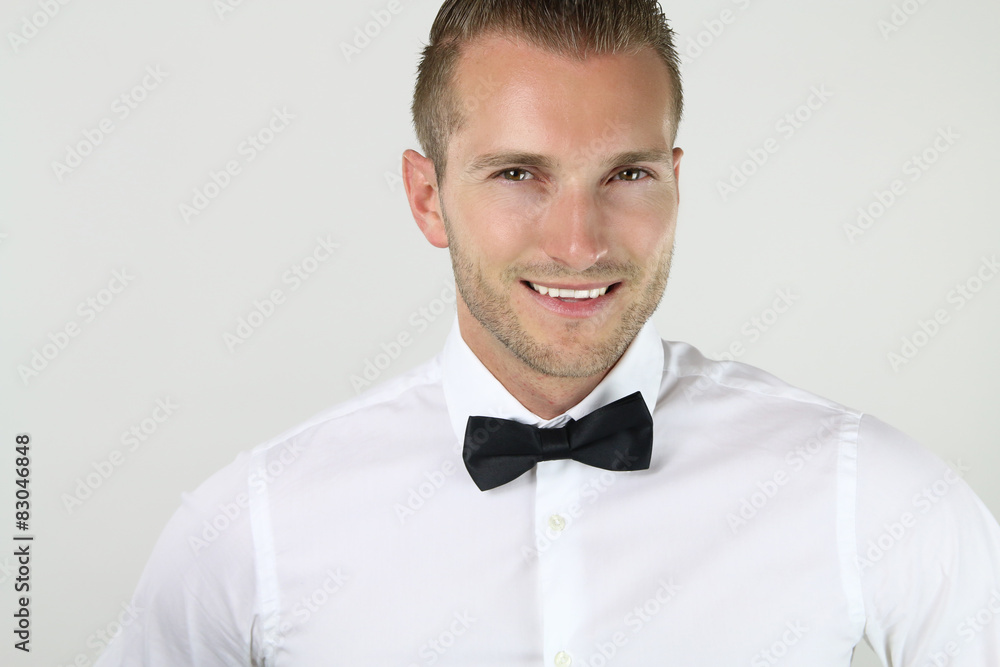 handsome blond man wearing a bow tie handsome blond man wearing a bow tie