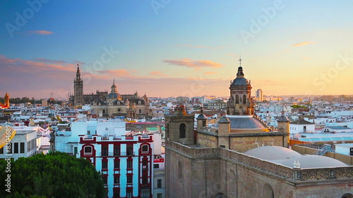 Seville, Spain old quarter skyline at dusk.