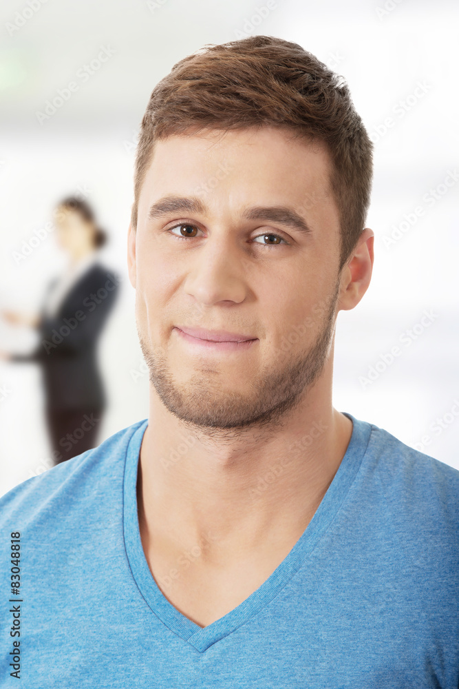 Handsome man smiling to camera. Handsome man smiling to camera.