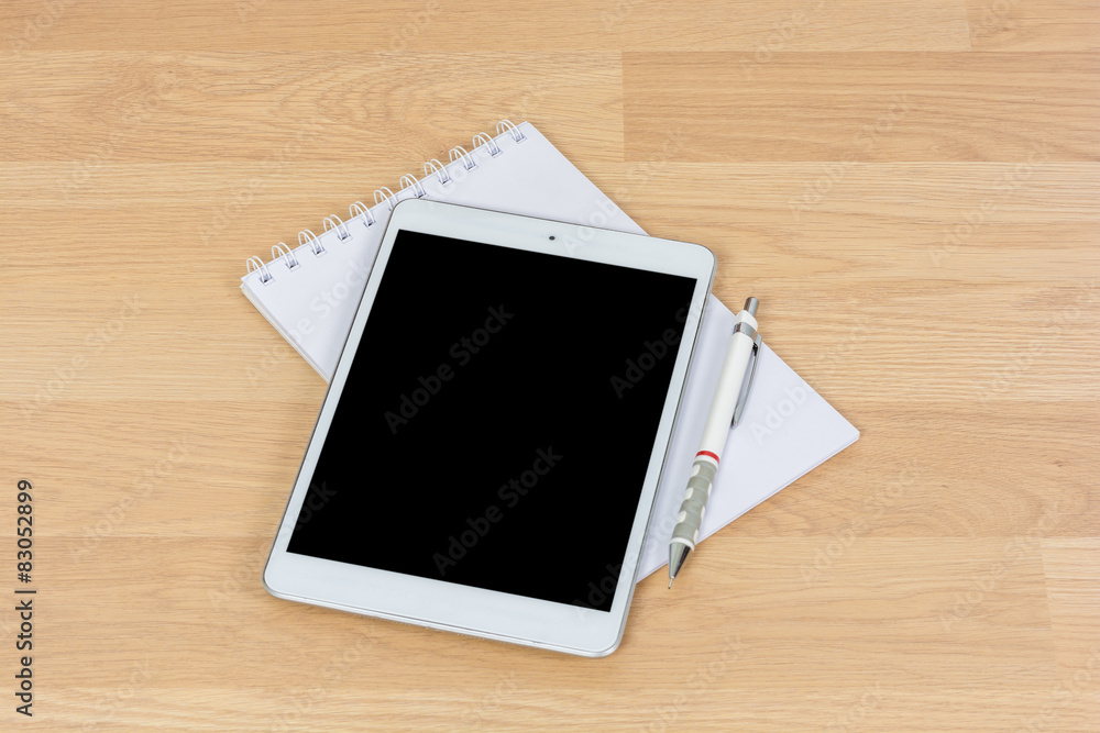 White digital Tablet on wooden White digital Tablet on wooden