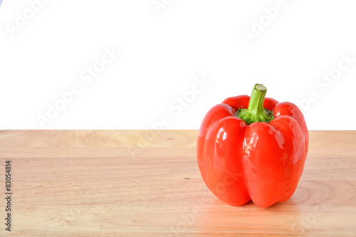 red pepper on wooden table