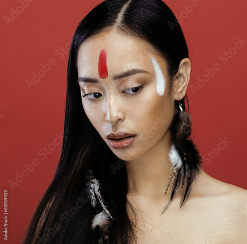 Fotografie beauty young asian girl with make up like Pocahontas, red indian