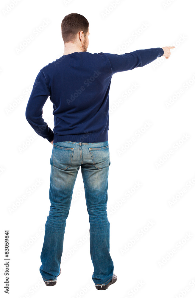 Back view of pointing young men in jeans Back view of pointing young men in jeans