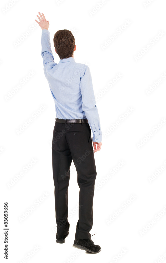 Back view of pointing business man. Back view of pointing business man.