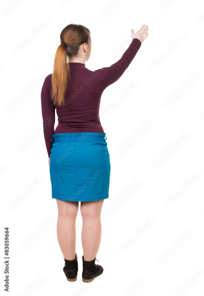 Back view of pointing woman Back view of pointing woman