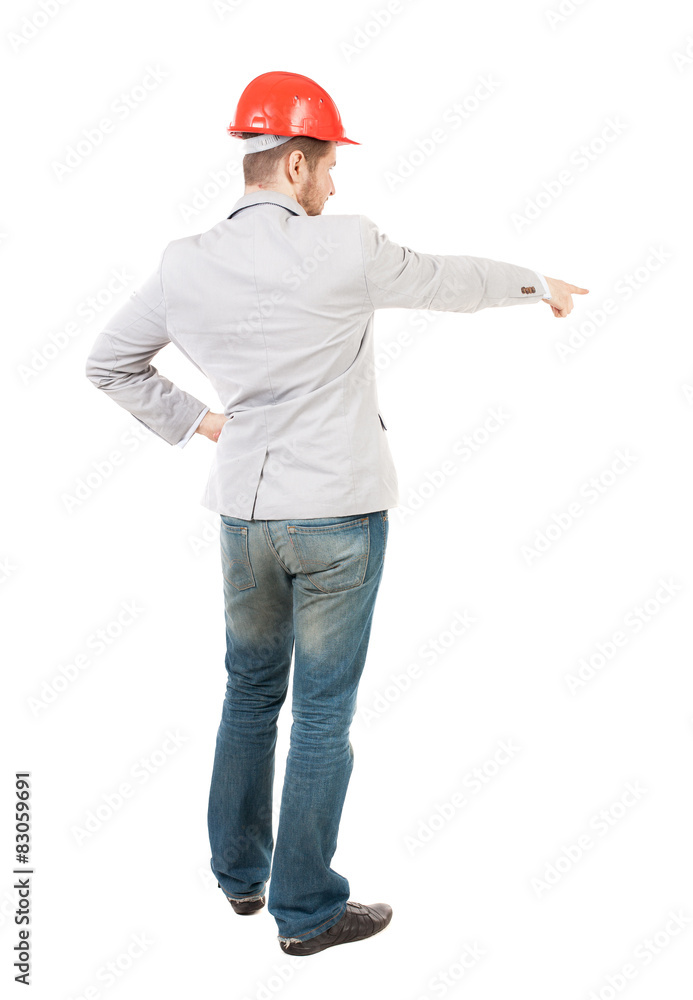 Back view of pointing young men in helmet. Back view of pointing young men in helmet.