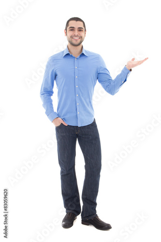 young arabic business man in blue shirt pointing at something is